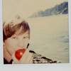 Deb oceanside with apple.